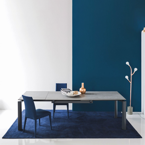 Esteso extendable dining table staged